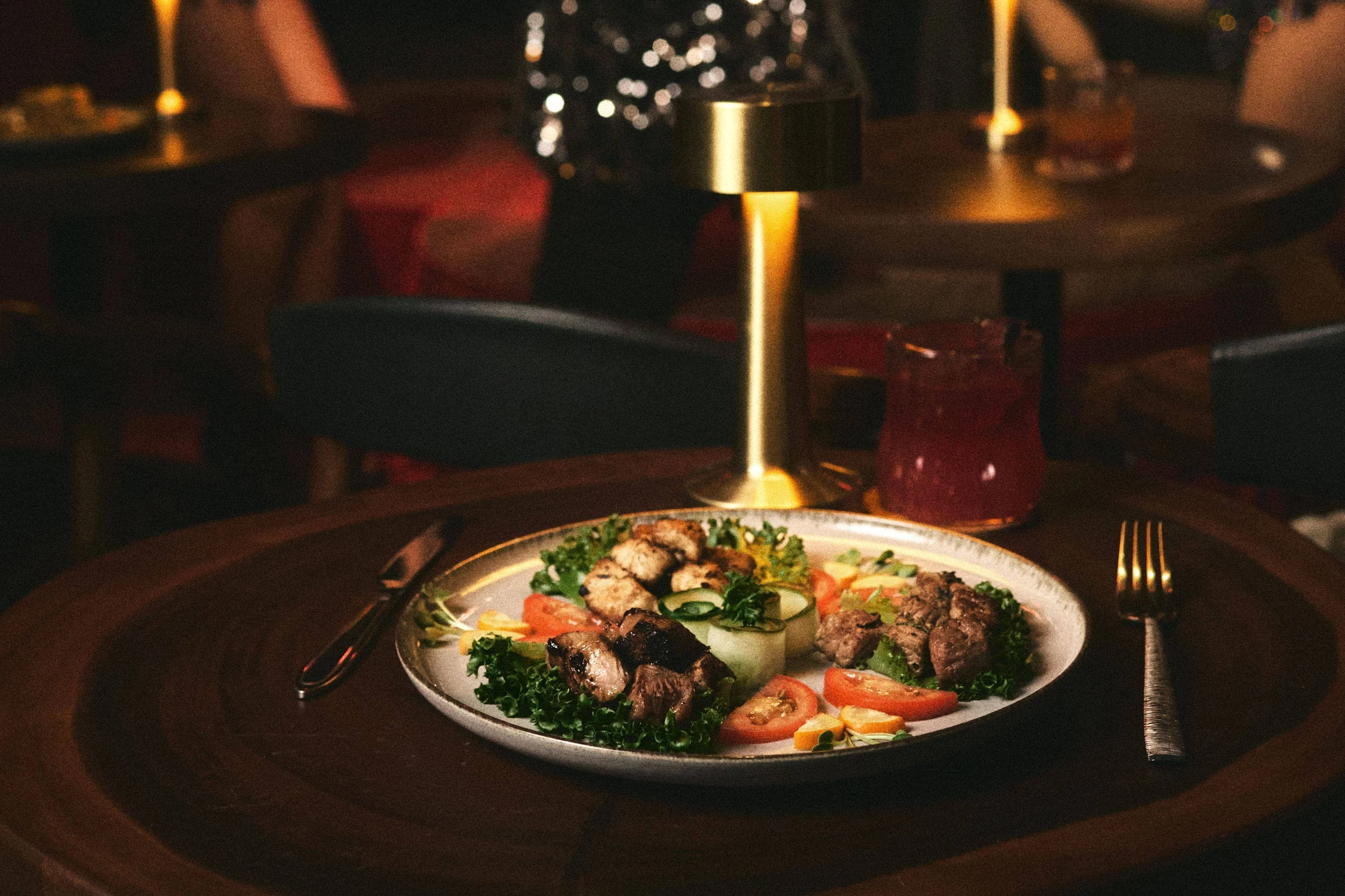 Dining with entertainment Da Nang at an intimate House of Legends theatre table