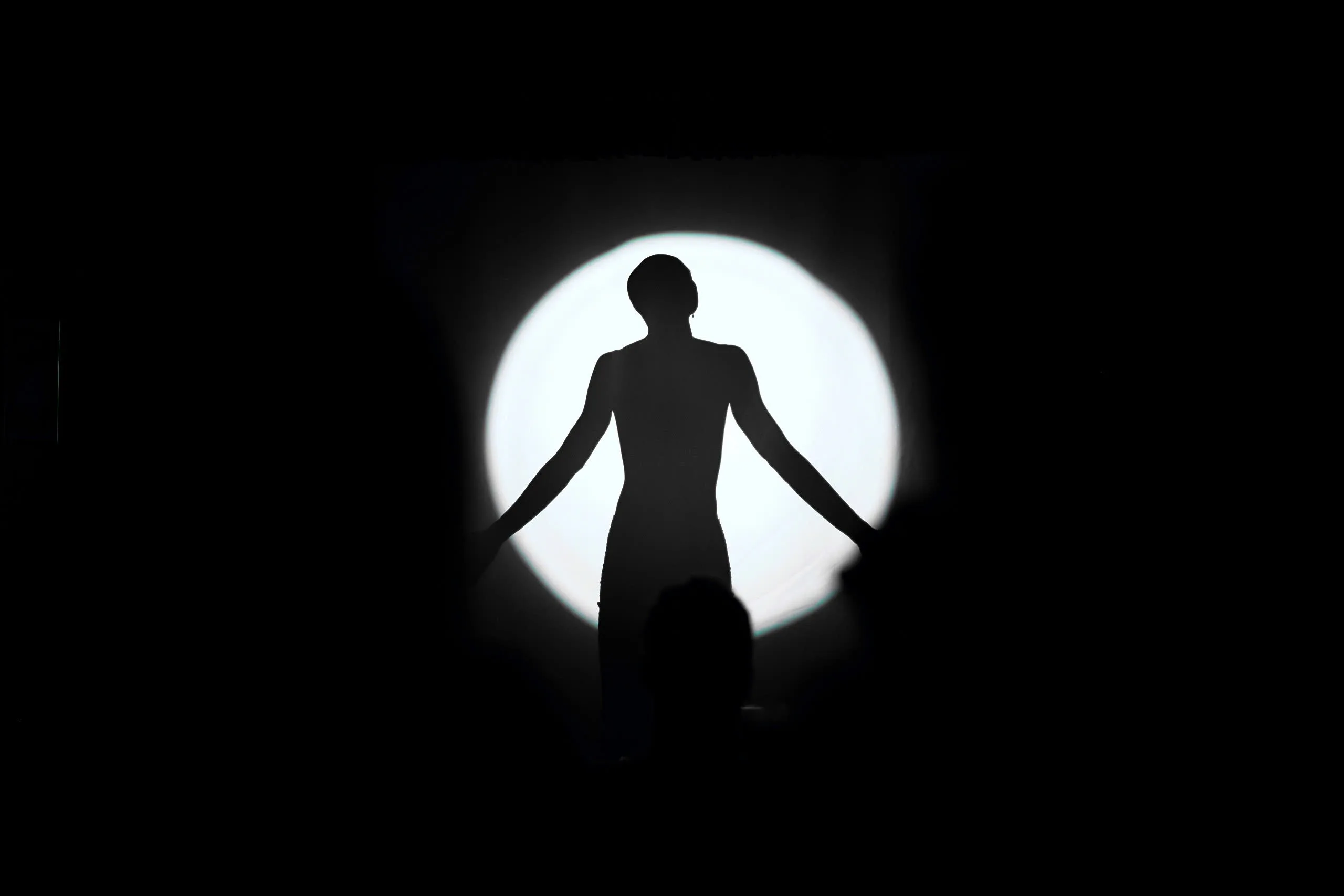 Performer under stage light
